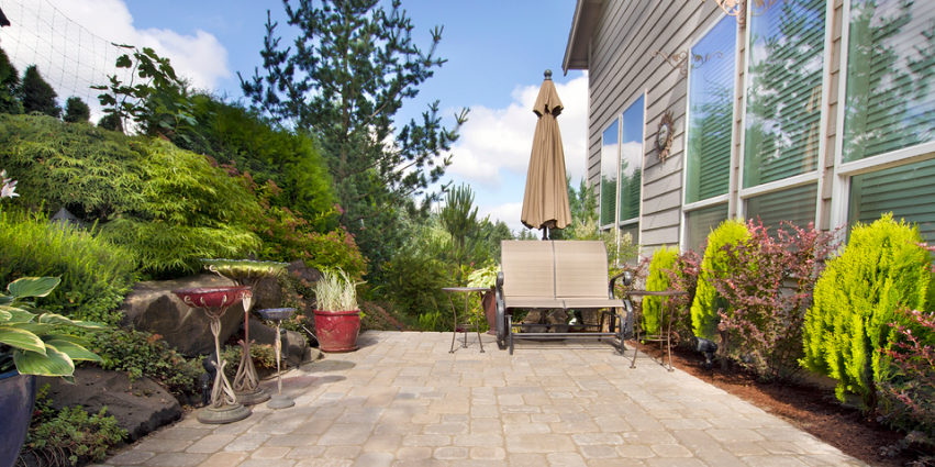 Side of the house with plants - Turnkey Paver Patios